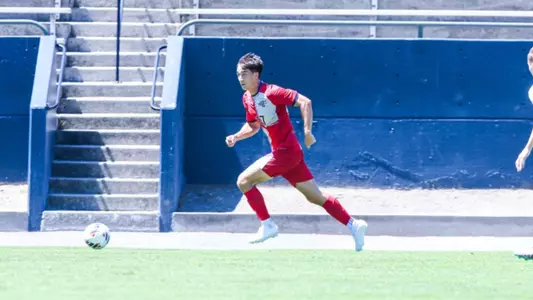 Fynn Allmon races upfield