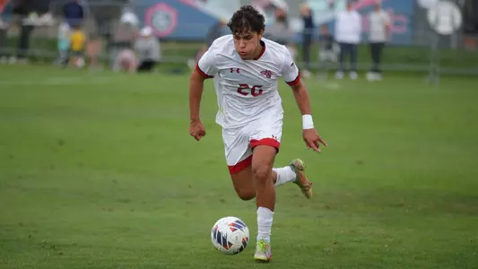 Hector Serrano-Martin pushes the ball upfield