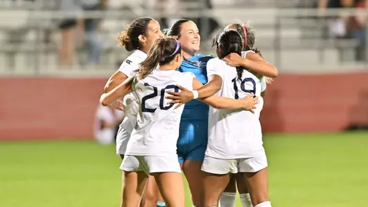 team celebrates win over Number 15 Washington State