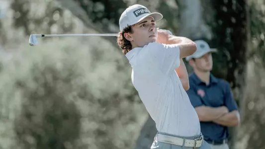 Jack Jerge follow through on a swing