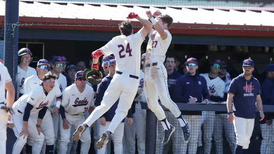 Ryan Pierce and Coleman Schmidt celebrate a home run