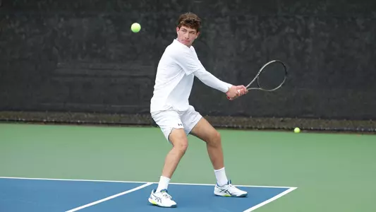 Etchecoin two handed backhand swing