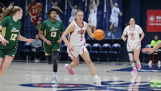 Leia Hanfin brings the ball up court