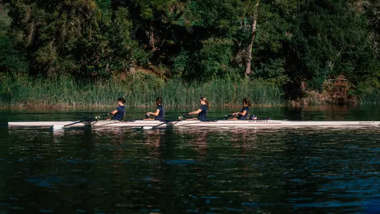 4 rowers in action