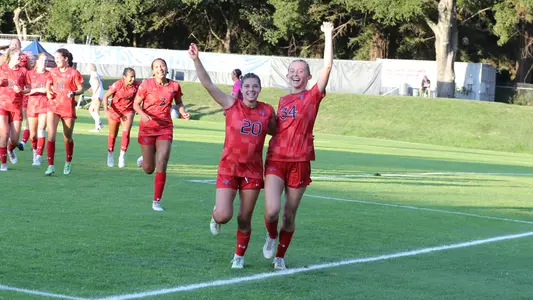 towle and lucas celebrating a shot