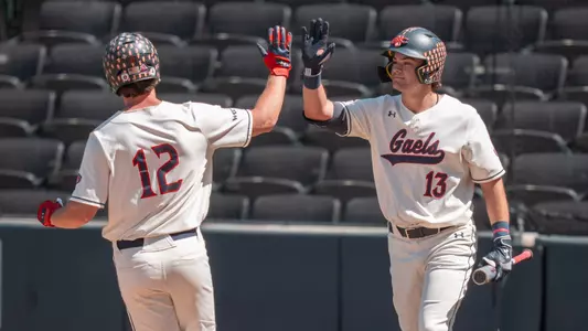 May 21, 2025; Las Vegas, NV, USA; Saint Mary's Gaels designated hitter Brian Duroff (12) and first baseman Eddie Madrigal (13) during the WCC Baseball Championships at Las Vegas Ballpark.