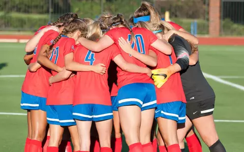 W-Soccer Team huddle
