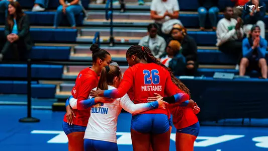 Group huddle at Syracuse