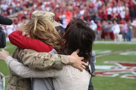 Sergeant,Family Reunite in Memorial Stadium