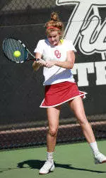 Brhane Advances in Singles and Doubles