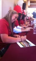 Softball Team to Sign Autographs at Men's Basketball Game