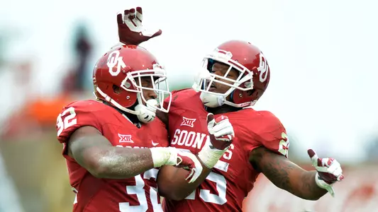 Perine, Mixon Go Off in 63-27 Win Over Tech