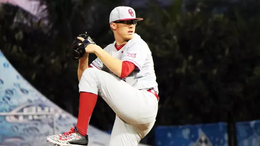 Elliott Pitches OU to Win in Opener