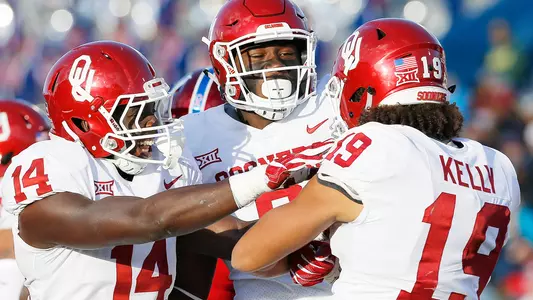 Sooners Roll Kansas, 41-3, for 10th Win
