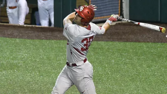 Sooners Fight for Extra-Inning Win at No. 25 WVU