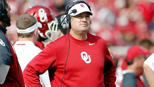 Stoops Back in the Coaching Saddle