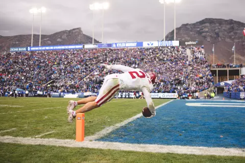 Oklahoma defensive back Billy Bowman dives in the end zone after returning an interception 99-yards during a game against BYU on Nov. 18, 2023 in Lavell Edwards Stadium in Provo, UT. (Photo by Morgan Givens/Oklahoma Athletics)