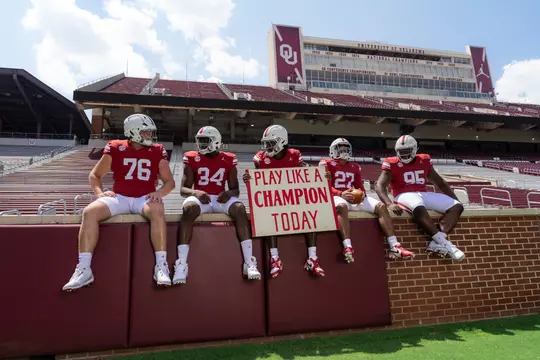 NORMAN, OK - August 05, 2024 - Oklahoma Offensive lineman Jacob Sexton (#76), Oklahoma Defensive Lineman Adepoju Adebawore (#34), Oklahoma Defensive back Gentry Williams (#9), Oklahoma Running back Gavin Sawchuk (#27) and Oklahoma Defensive lineman Da'Jon Terry (#95) during Oklahoma Sooners Football Throwback Uniform photoshoot in Norman, OK. Photo By Morgan Givens/University of Oklahoma