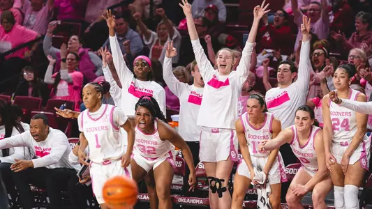 Oklahoma's bench celebrates in the 2023 Pink Game after a Nevaeh Tot 3-pointer.