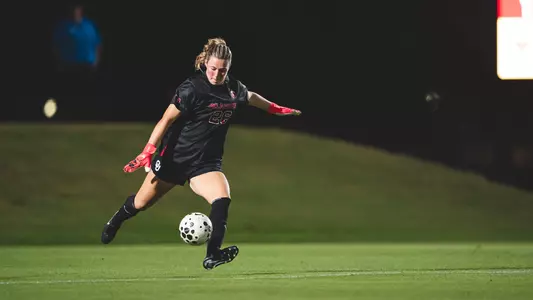 Caroline Duffy kicking the ball during the game against #4 Tennessee