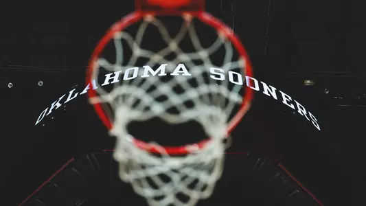 Shot from underneath the basket on one end of the Lloyd Noble Center