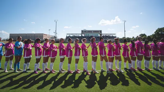 OU soccer lining up for the national anthem ahead of its game against Texas A&M
