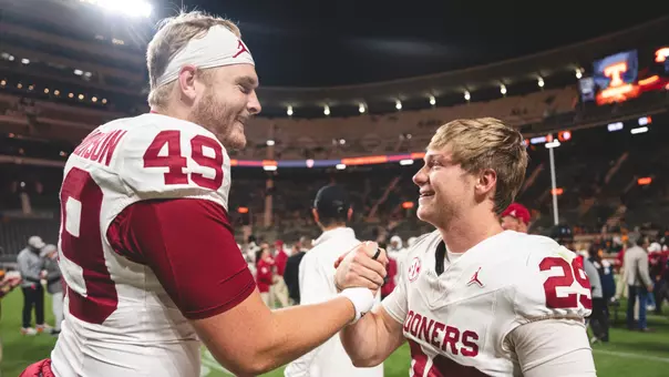 Ben Anderson and Tate Sandell shake hands on the field after OU's win at Tennessee at Neyland Stadium on Nov. 1, 2025