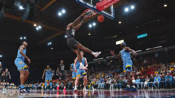 Derrion Reid dunking in win against Marquette