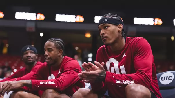 Tae Davis and Derrion Reid await starting lineup announcements during the game against Marquette
