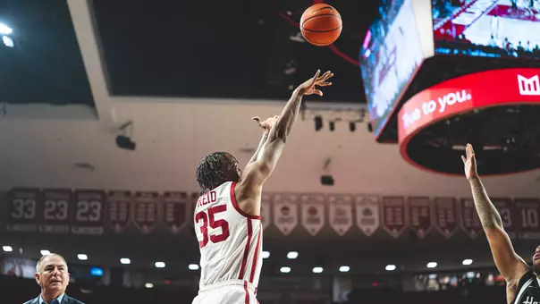 Derrion Reid shooting a jump shot against Stetson