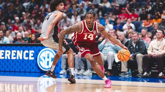 Jalon Moore drives around a Georgia defender in OU's SEC Tournament opener on March 12, 2025 at Bridgestone Arena in Nashville, Tenn.