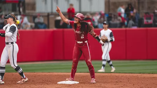 Nelly McEnroe-Marinas celebrating a double against Arkansas