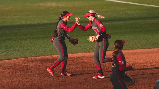 Hannah Coor and Ailana Agbayani high five