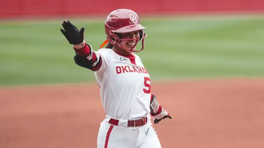 Ailana Agbayani rounding third base after a home run against Cal