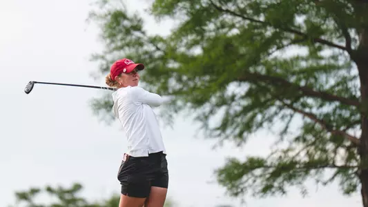 Reagan Chaney swings during the first round of the 2025 NCAA Norman Regional