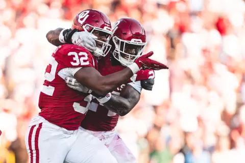 NORMAN, OK - September 14, 2024 - Oklahoma Defensive lineman R Mason Thomas (#32) and Oklahoma Linebacker Samuel Omosigho (#24) during the game between the Tulane Green Wave and the Oklahoma Sooners at Gaylord Family - Oklahoma Memorial Stadium in Norman, OK. Photo By Morgan Givens/University of Oklahoma