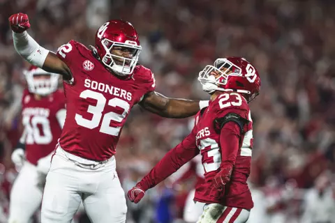 NORMAN, OK - November 23, 2024 - Oklahoma Defensive lineman R Mason Thomas (#32) and Oklahoma Defensive back Eli Bowen (#23) during the game between the Alabama Crimson Tide and the Oklahoma Sooners at Gaylord Family - Oklahoma Memorial Stadium in Norman, OK. Photo By Peyton Martin/University of Oklahoma