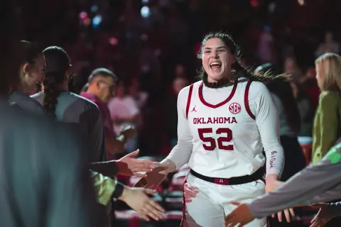 NORMAN, OK - December 15, 2024 - Oklahoma Center Raegan Beers (#52) during the game between the Oral Roberts Golden Eagles and the Oklahoma Sooners at Lloyd Noble Center in Norman, OK. Photo By Morgan Givens/University of Oklahoma