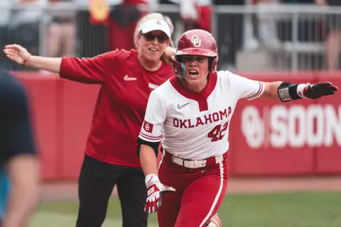 NORMAN, OK - April 27, 2025 - Oklahoma Infielder Gabbie Garcia (#42) and Oklahoma Softball Head Coach Patty Gasso during the game between the Texas Longhorns and the Oklahoma Sooners at Love's Field in Norman, OK. Photo By Morgan Givens/University of Oklahoma