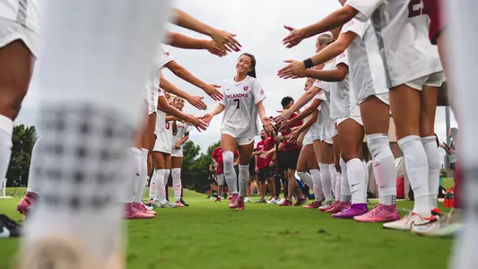 Michelle Park going through high five line