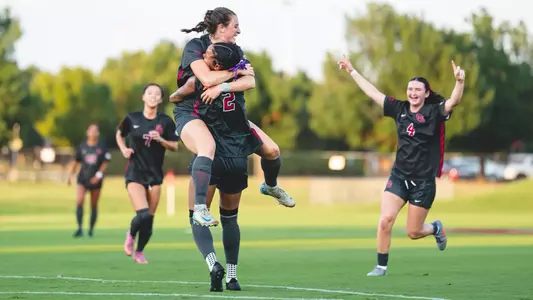 Kayla Keefer and Naomi Clark celebration after her goal against North Texas