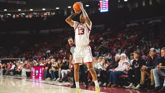 Tae Davis shooting a jump shot during a game against Arkansas
