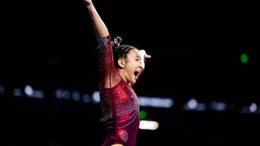 Keira Wells celebrates her vault