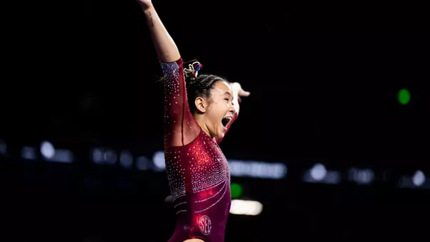Keira Wells celebrates her vault