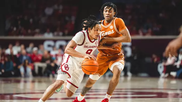 Nijel Pack drives to the basket against Texas