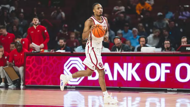 Xzayvir Brown dribbling the ball up the court against Ole Miss