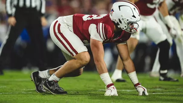 Defensive end Jake Kreul, wearing OU's throwback football uniform, down in his stance in OU's game against Kentucky on Oct. 17, 2026 at Gaylord Family - Oklahoma Memorial Stadium