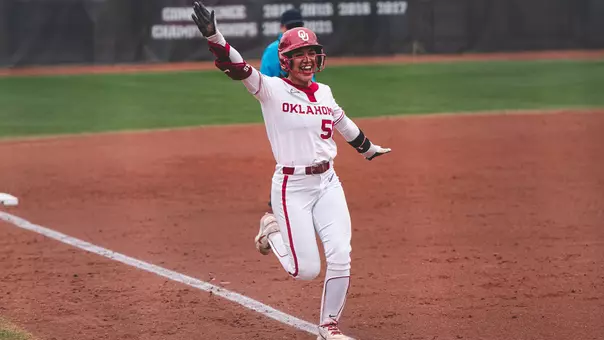 Ailana Agbayani rounding third base after a home run
