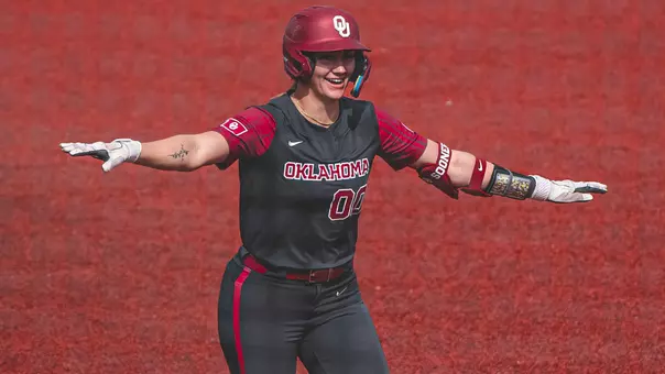 Allyssa Parker rounding third base against UTEP