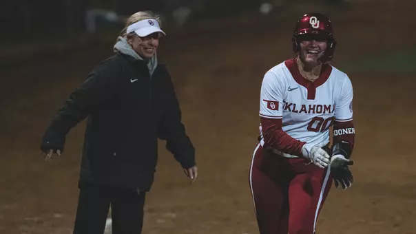 Allyssa Parker rojunding home after hitting a game-tying home run against Fullerton